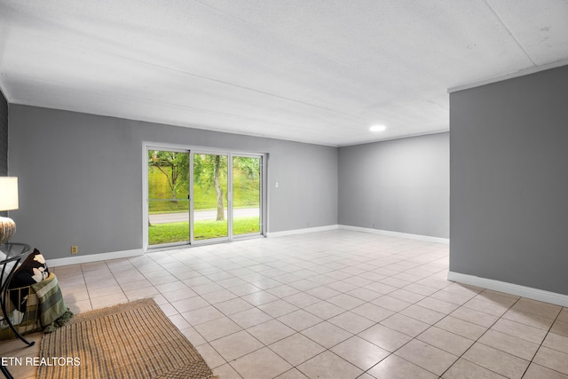 467 Canberra Dr Unit B103, Knoxville, TN 37923 - unfurnished living room featuring light tile patterned flooring, baseboards, and recessed lighting