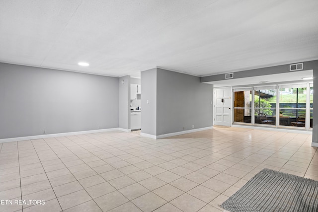 467 Canberra Dr Unit B103, Knoxville, TN 37923 - unfurnished room featuring baseboards, light tile patterned floors, and recessed lighting