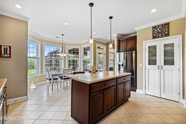 1636 Stone Harbor Blvd, Lenoir City, TN 37772 - kitchen featuring stainless steel refrigerator with ice dispenser, light tile patterned floors, baseboards, decorative light fixtures, and ornamental molding