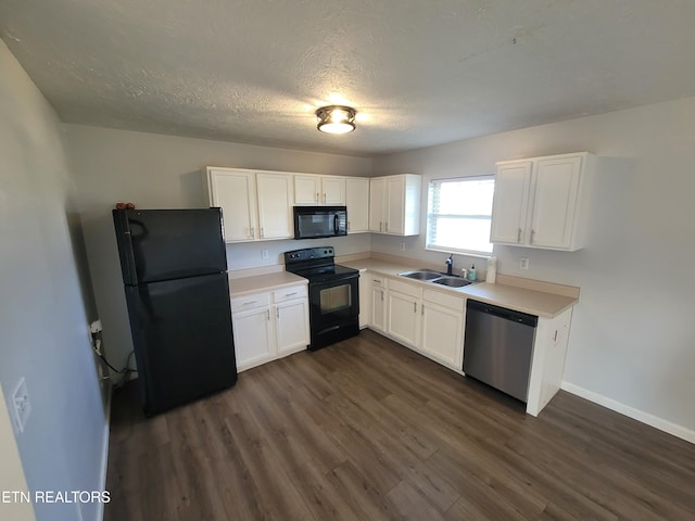 4121 Briggs Loop, Kodak, TN 37764 - kitchen with black appliances, a sink, dark wood finished floors, white cabinetry, and a textured ceiling