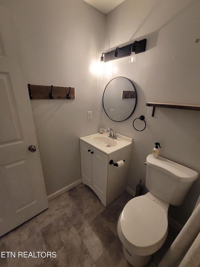 4121 Briggs Loop, Kodak, TN 37764 - bathroom featuring vanity, baseboards, and toilet