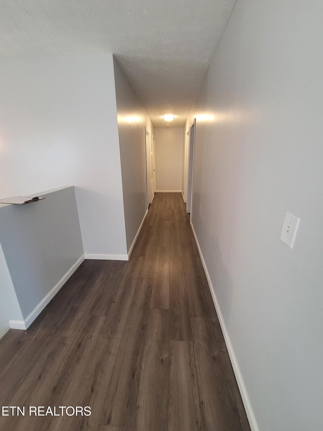 4121 Briggs Loop, Kodak, TN 37764 - hall with dark wood-style flooring and baseboards