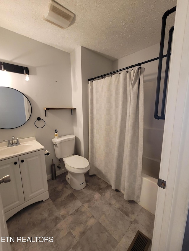 4121 Briggs Loop, Kodak, TN 37764 - bathroom with toilet, vanity, a textured ceiling, and shower / bath combo with shower curtain