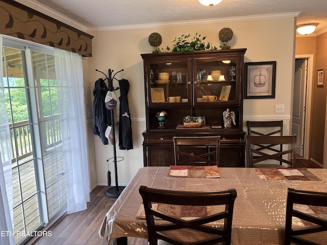 3385 Double Top Rd, Byrdstown, TN 38549 - dining space with wood finished floors, ornamental molding, and a textured ceiling