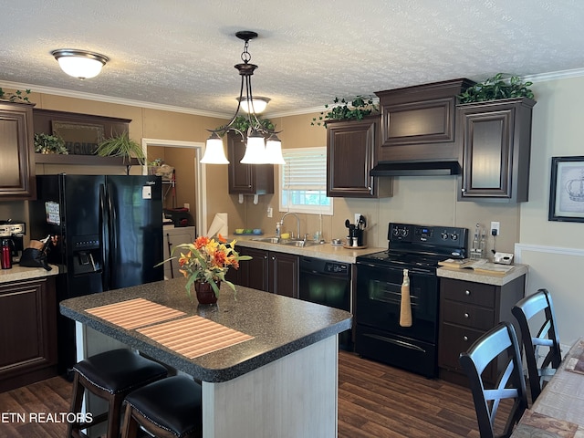 3385 Double Top Rd, Byrdstown, TN 38549 - kitchen with black appliances, a sink, dark wood-style flooring, dark brown cabinetry, and a kitchen island