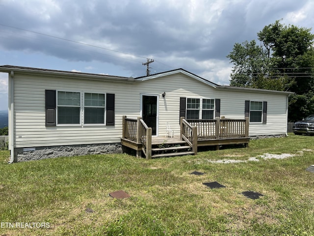 3385 Double Top Rd, Byrdstown, TN 38549 - back of property featuring a deck and a lawn
