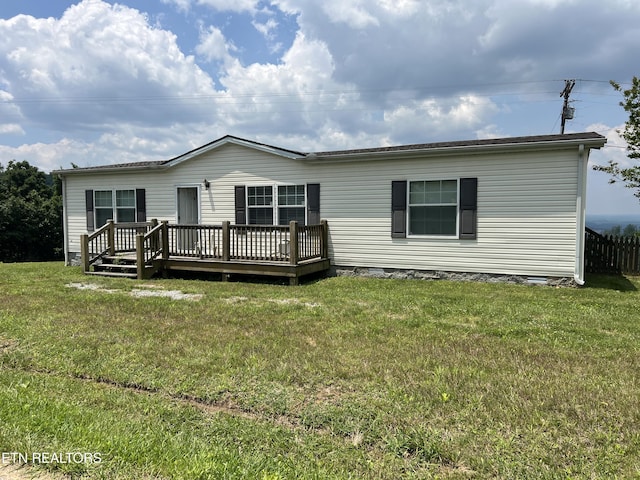 3385 Double Top Rd, Byrdstown, TN 38549 - rear view of property with a wooden deck and a yard