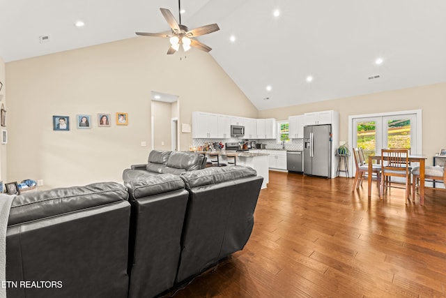 321 Timber Creek Rd, Maynardville, TN 37807 - living area with high vaulted ceiling, a ceiling fan, and dark wood finished floors