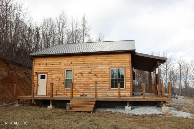 840 Ali Ln, Pvt, Huntsville, TN 37756 - view of property exterior featuring metal roof and a deck