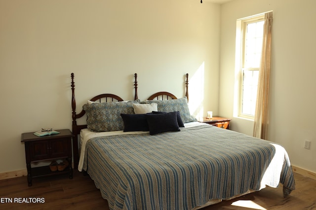 840 Ali Ln, Pvt, Huntsville, TN 37756 - bedroom featuring wood finished floors, multiple windows, and baseboards