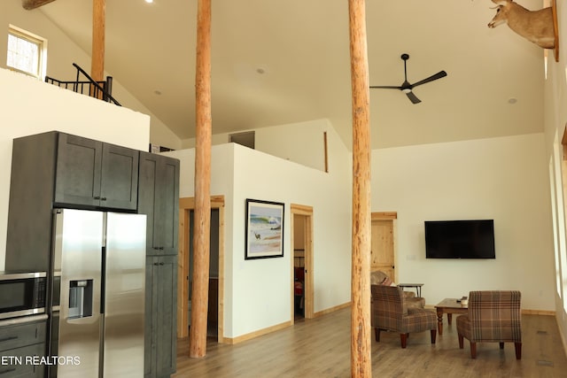 840 Ali Ln, Pvt, Huntsville, TN 37756 - kitchen with stainless steel appliances, high vaulted ceiling, ceiling fan, light wood-style floors, and beam ceiling