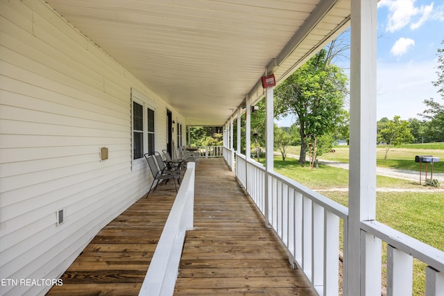 168 Boatman Rd, Cookeville, TN 38506 - wooden porch with a lawn