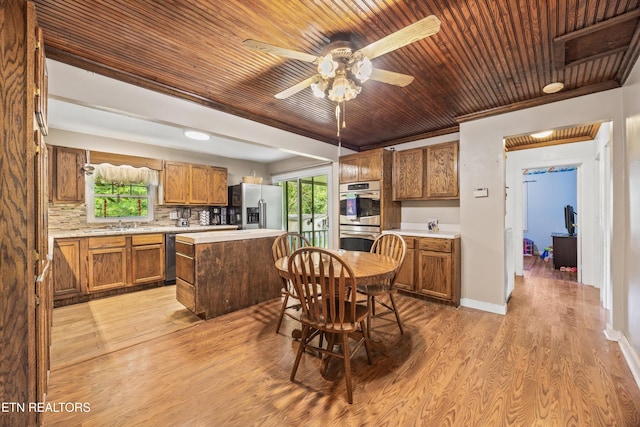 168 Boatman Rd, Cookeville, TN 38506 - dining area featuring plenty of natural light, wooden ceiling, light wood finished floors, a ceiling fan, and baseboards