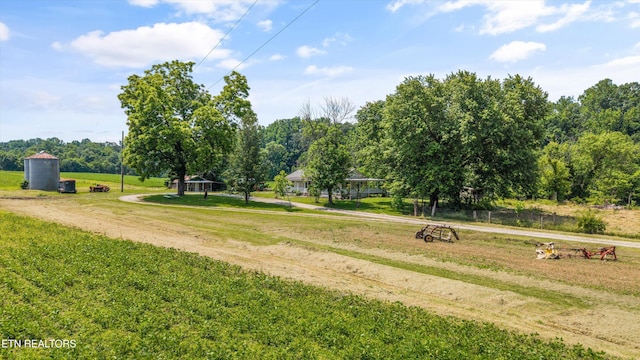 168 Boatman Rd, Cookeville, TN 38506 - surrounding community with a lawn, driveway, and view of scattered trees