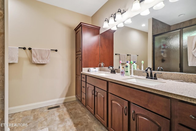 247 Thrushwood Dr, Fairfield Glade, TN 38558 - bathroom with baseboards, double vanity, and a stall shower