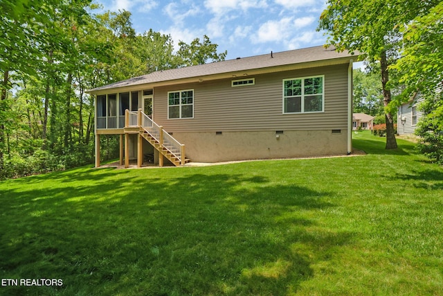 247 Thrushwood Dr, Fairfield Glade, TN 38558 - rear view of house with crawl space, stairway, a sunroom, and a yard