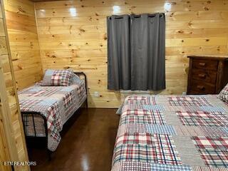 138 Matthews Rd, Oneida, TN 37841 - bedroom featuring wooden walls