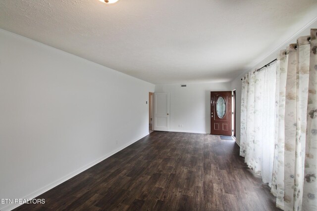 119 Briar Rd, Oak Ridge, TN 37830 - unfurnished room featuring dark wood-style flooring and baseboards