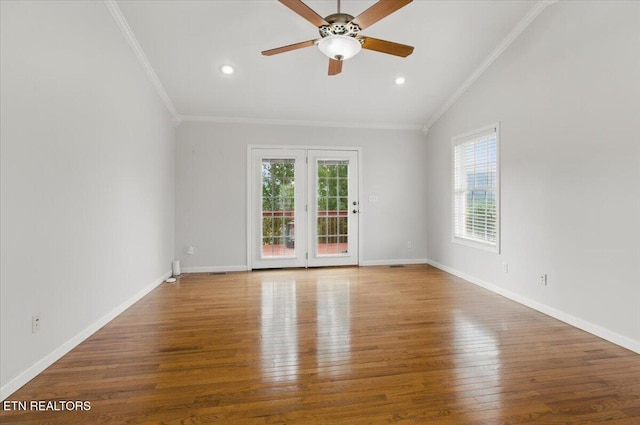 262 Cresent St, Harrogate, TN 37752 - spare room featuring healthy amount of natural light, crown molding, wood finished floors, vaulted ceiling, and ceiling fan