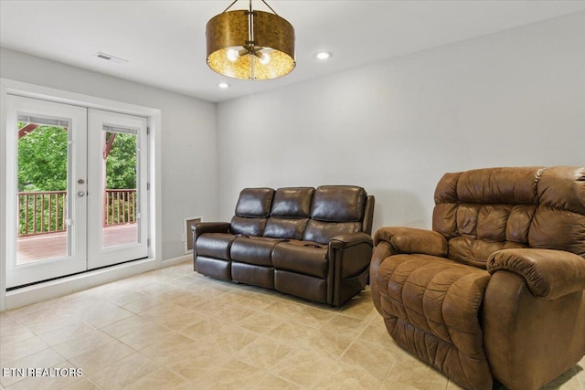 262 Cresent St, Harrogate, TN 37752 - living area with french doors, light tile patterned flooring, and recessed lighting
