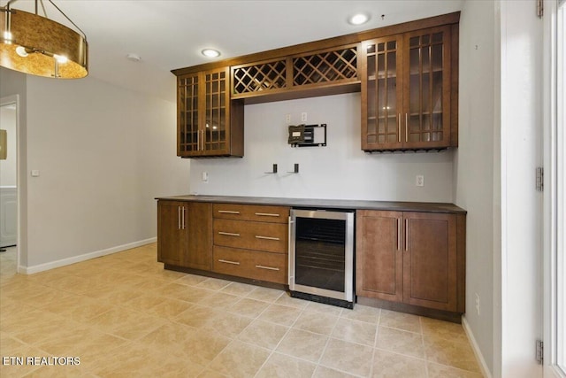 262 Cresent St, Harrogate, TN 37752 - indoor dry bar with beverage cooler, baseboards, recessed lighting, and hanging light fixtures