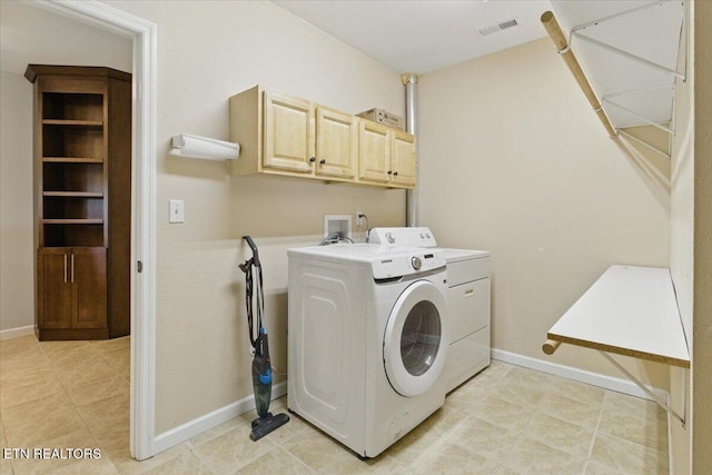 262 Cresent St, Harrogate, TN 37752 - washroom featuring washing machine and dryer, cabinet space, baseboards, and light tile patterned floors