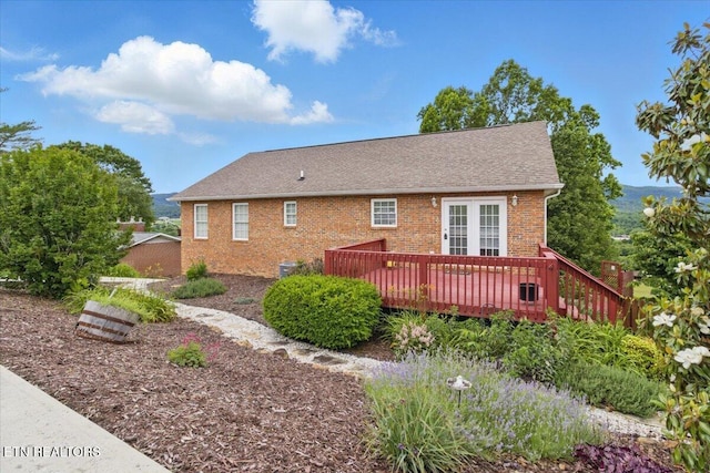 262 Cresent St, Harrogate, TN 37752 - rear view of property with a wooden deck, brick siding, and roof with shingles