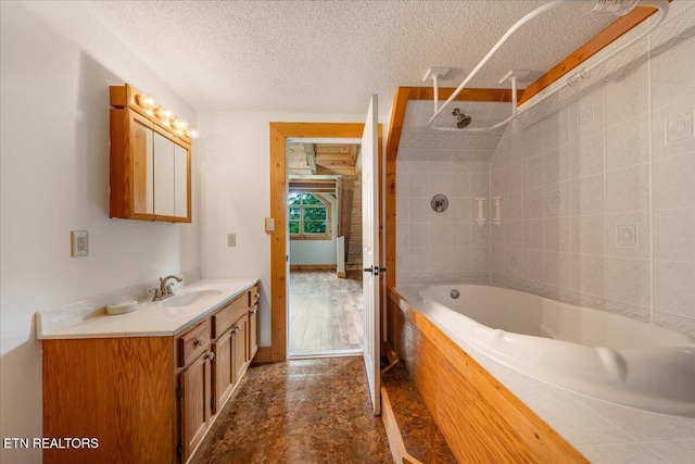 158 Dillon Rd, Baxter, TN 38544 - full bath featuring vanity, a textured ceiling, baseboards, and shower / bath combination