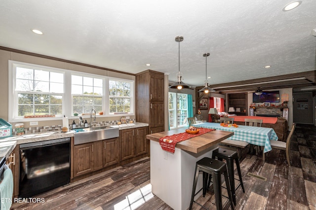 1193 Johnson Rd, Seymour, TN 37865 - kitchen with black dishwasher, a sink, dark wood finished floors, healthy amount of natural light, and recessed lighting