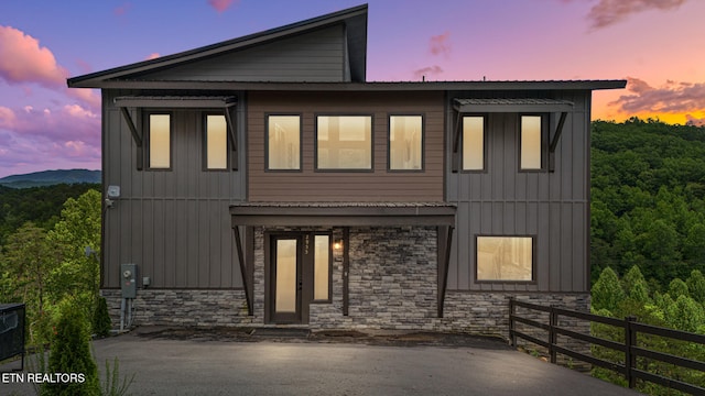 2955 Lightning Strike Dr, Sevierville, TN 37862 - view of front facade featuring stone siding and board and batten siding