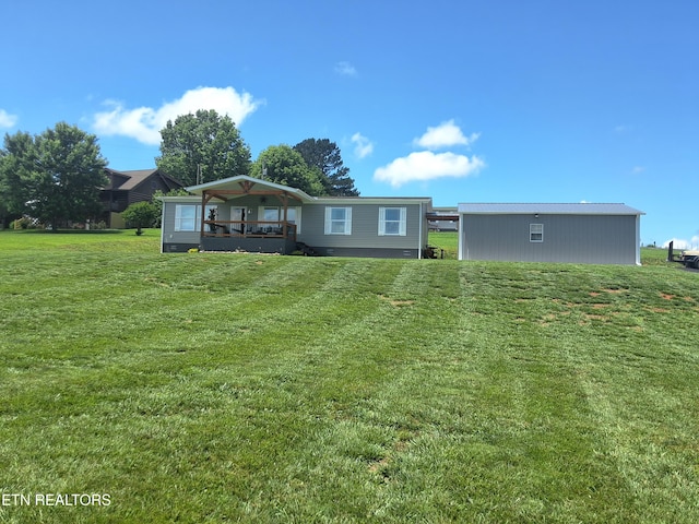 1748 Circle Lake Dr, Dandridge, TN 37725 - rear view of property featuring a lawn