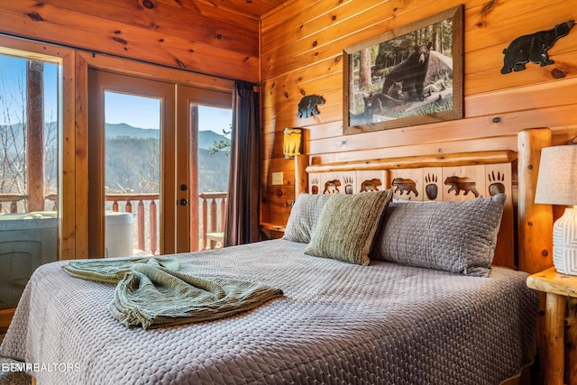 204 Pinnacle Dr, Gatlinburg, TN 37738 - bedroom with french doors, access to outside, wooden walls, and a mountain view