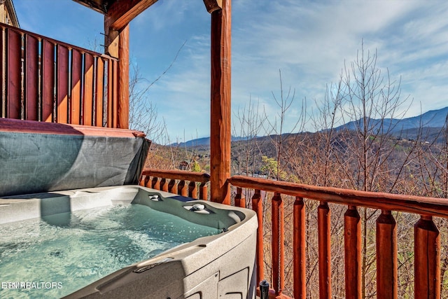 204 Pinnacle Dr, Gatlinburg, TN 37738 - wooden terrace featuring a hot tub and a mountain view