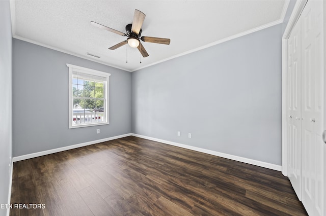10548 Lone Star Way, Knoxville, TN 37932 - unfurnished room with dark wood-style flooring, baseboards, crown molding, and a ceiling fan