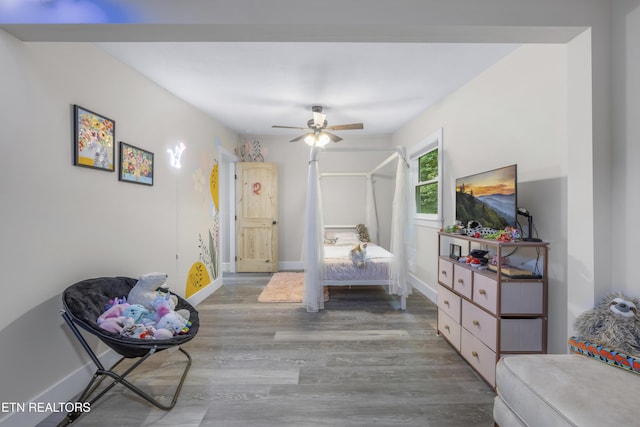 4509 Lifford Ln, Corryton, TN 37721 - bedroom with wood finished floors, baseboards, and a ceiling fan