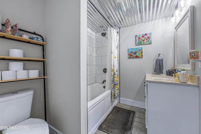 4509 Lifford Ln, Corryton, TN 37721 - bathroom with vanity, baseboards, toilet, wood finished floors, and shower / bath combo