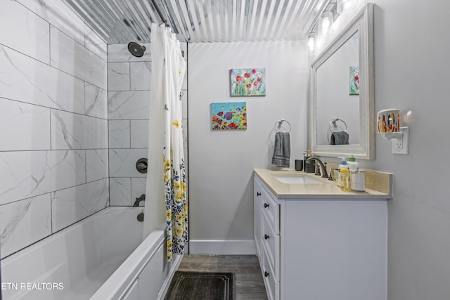 4509 Lifford Ln, Corryton, TN 37721 - bathroom featuring vanity, wood finished floors, shower / bath combo with shower curtain, and baseboards