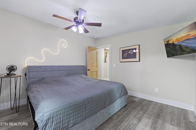 4509 Lifford Ln, Corryton, TN 37721 - bedroom featuring wood finished floors, baseboards, and ceiling fan