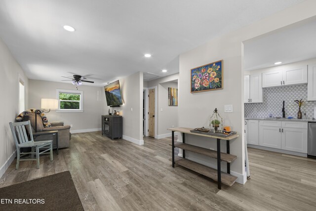 4509 Lifford Ln, Corryton, TN 37721 - living room featuring a ceiling fan, light wood-style floors, baseboards, and recessed lighting