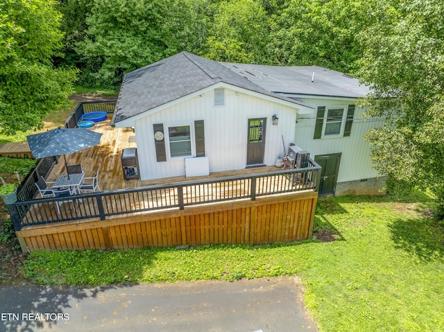 4509 Lifford Ln, Corryton, TN 37721 - back of house featuring a deck, a shingled roof, crawl space, and a lawn