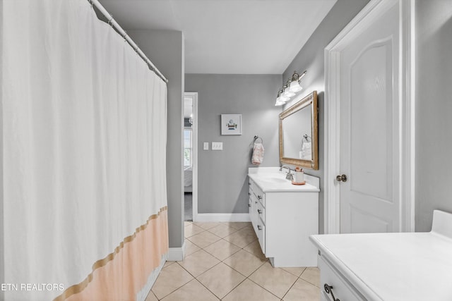 12332 Bonnybridge Ln, Knoxville, TN 37922 - full bathroom featuring vanity, tile patterned floors, and baseboards