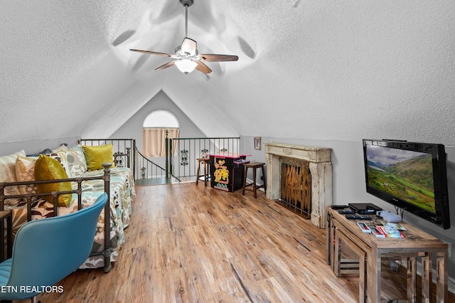 3325 Tekoa Mountain Way, Sevierville, TN 37876 - additional living space with ceiling fan, wood finished floors, a textured ceiling, and vaulted ceiling