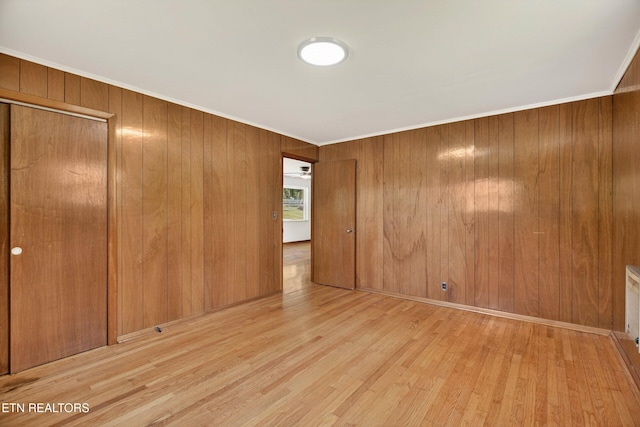 2594 Indian Creek Rd, Thorn Hill, TN 37881 - empty room featuring wood finished floors, wood walls, and ornamental molding