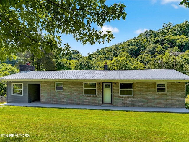 2594 Indian Creek Rd, Thorn Hill, TN 37881 - ranch-style home featuring a chimney, a patio, and a front yard