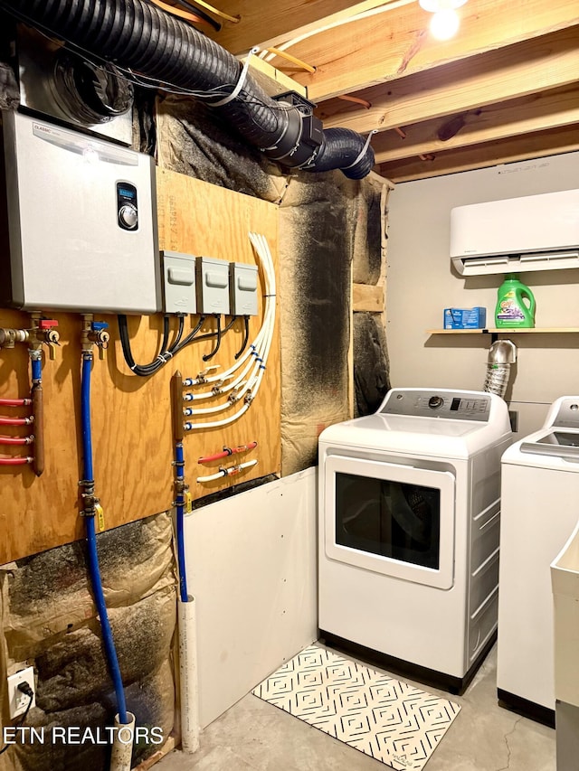 179 Wiggins Rd, Tellico Plains, TN 37385 - washroom featuring an AC wall unit and washing machine and dryer