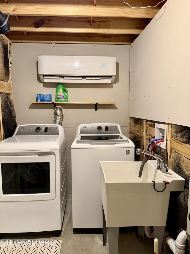 179 Wiggins Rd, Tellico Plains, TN 37385 - washroom with independent washer and dryer and a wall unit AC