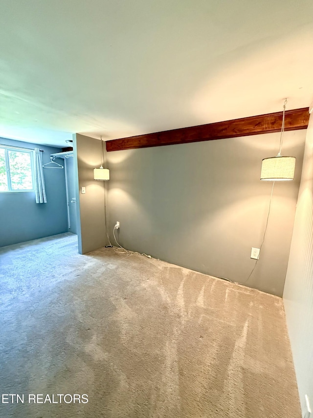 179 Wiggins Rd, Tellico Plains, TN 37385 - carpeted spare room with beamed ceiling