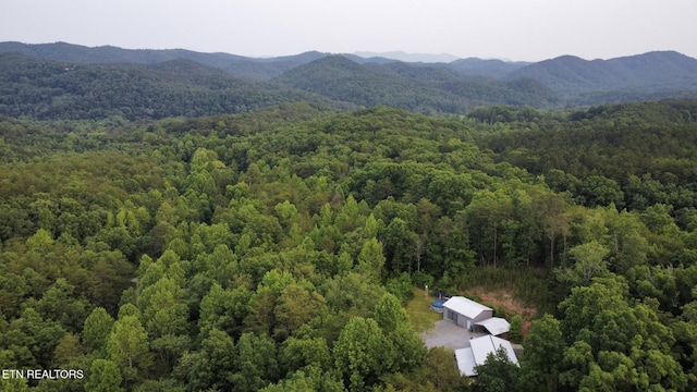 179 Wiggins Rd, Tellico Plains, TN 37385 - aerial view of a heavily wooded area and mountains