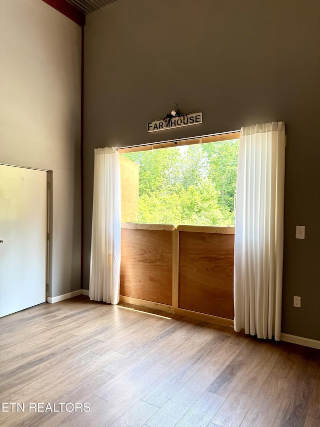 179 Wiggins Rd, Tellico Plains, TN 37385 - empty room with wood finished floors and baseboards