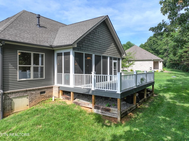126 Pocola Way, Loudon, TN 37774 - rear view of house featuring a shingled roof, a sunroom, a lawn, and a deck